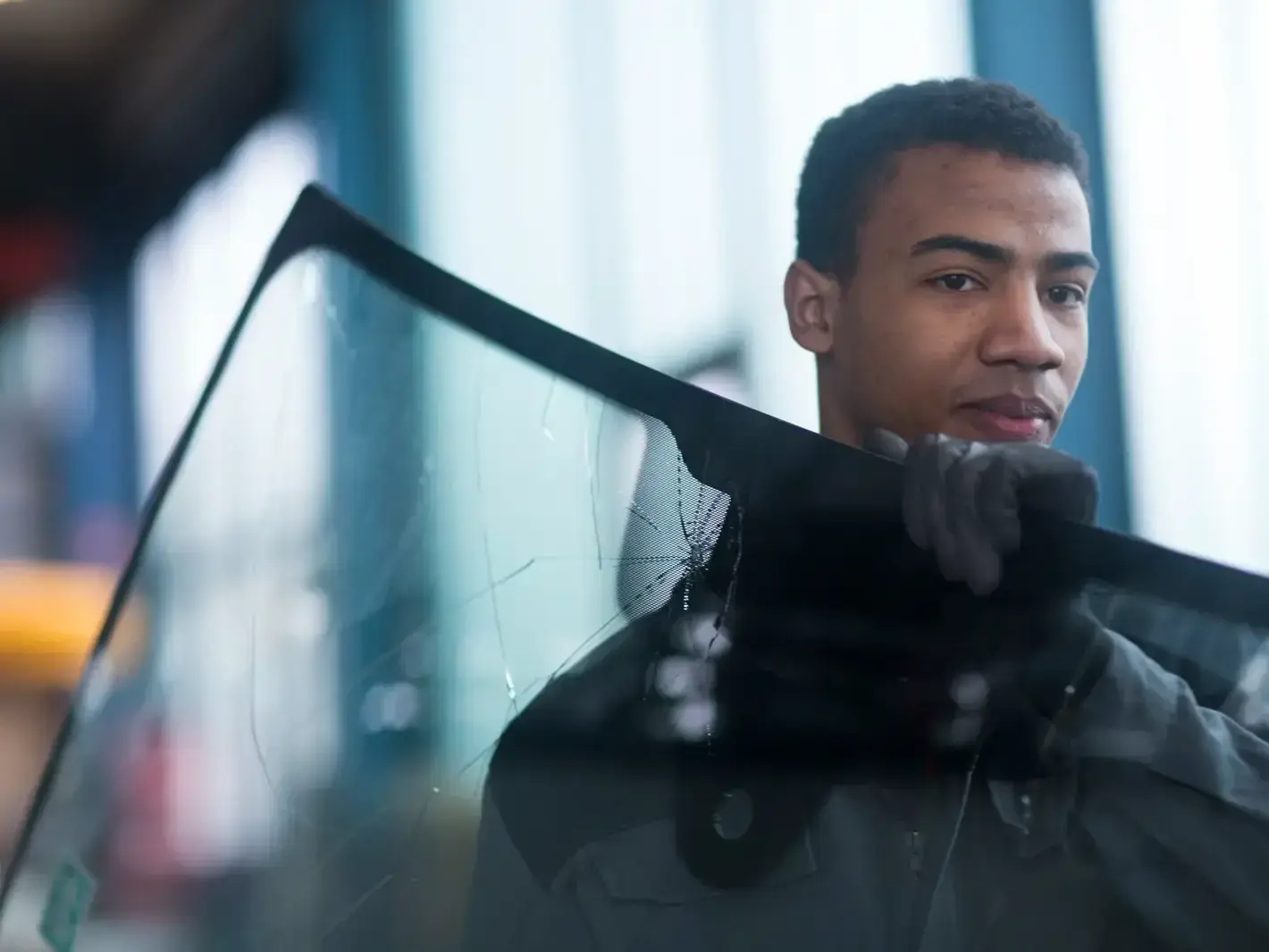Seattle windshield replacement service van near Pike Place Market helping downtown driver
