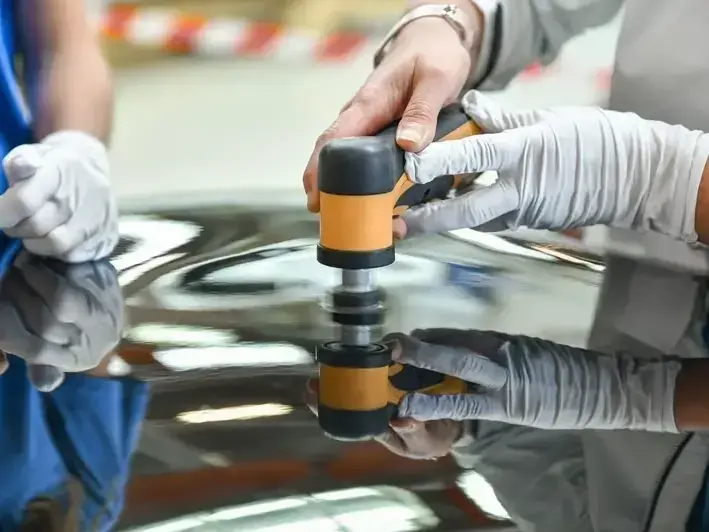mobile windshield repair technician working near Shoreline Community College parking area