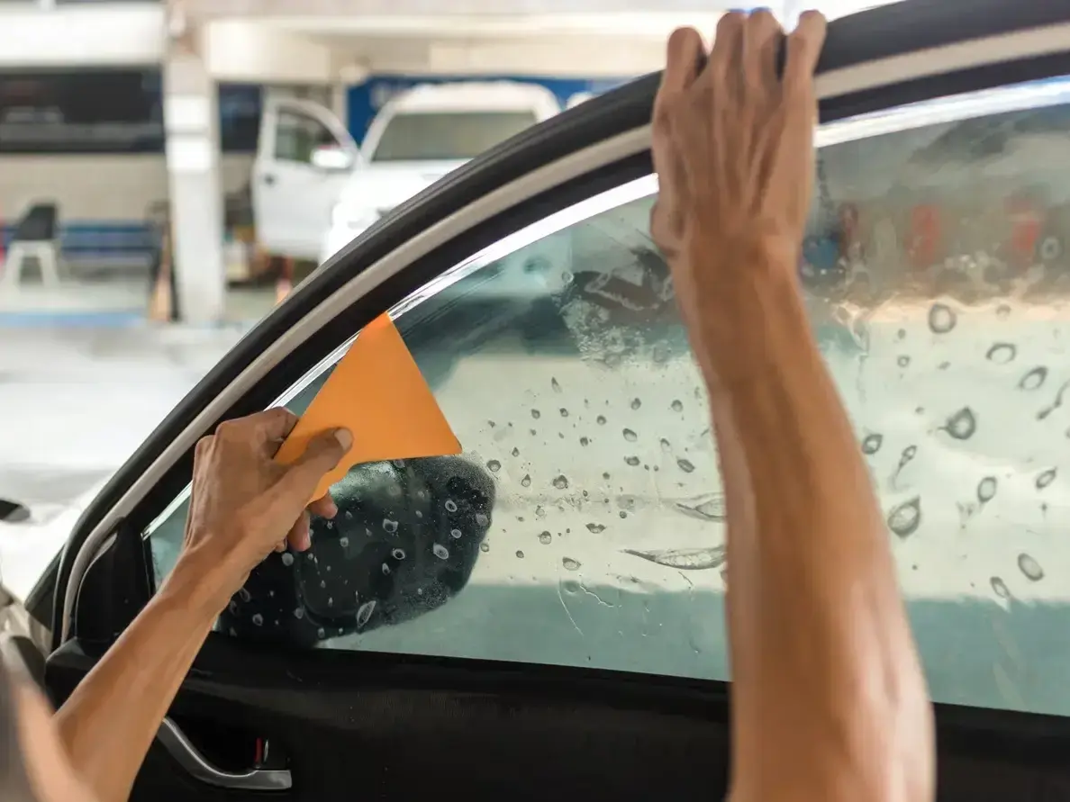 rock chip repair on a commuter car in North Burien during wet winter weather